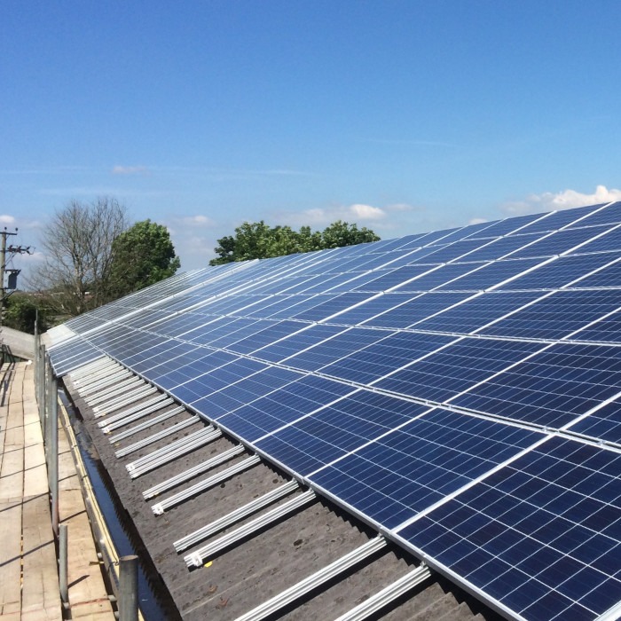 PV system on roof of unit on small industrial estate, Lancashire